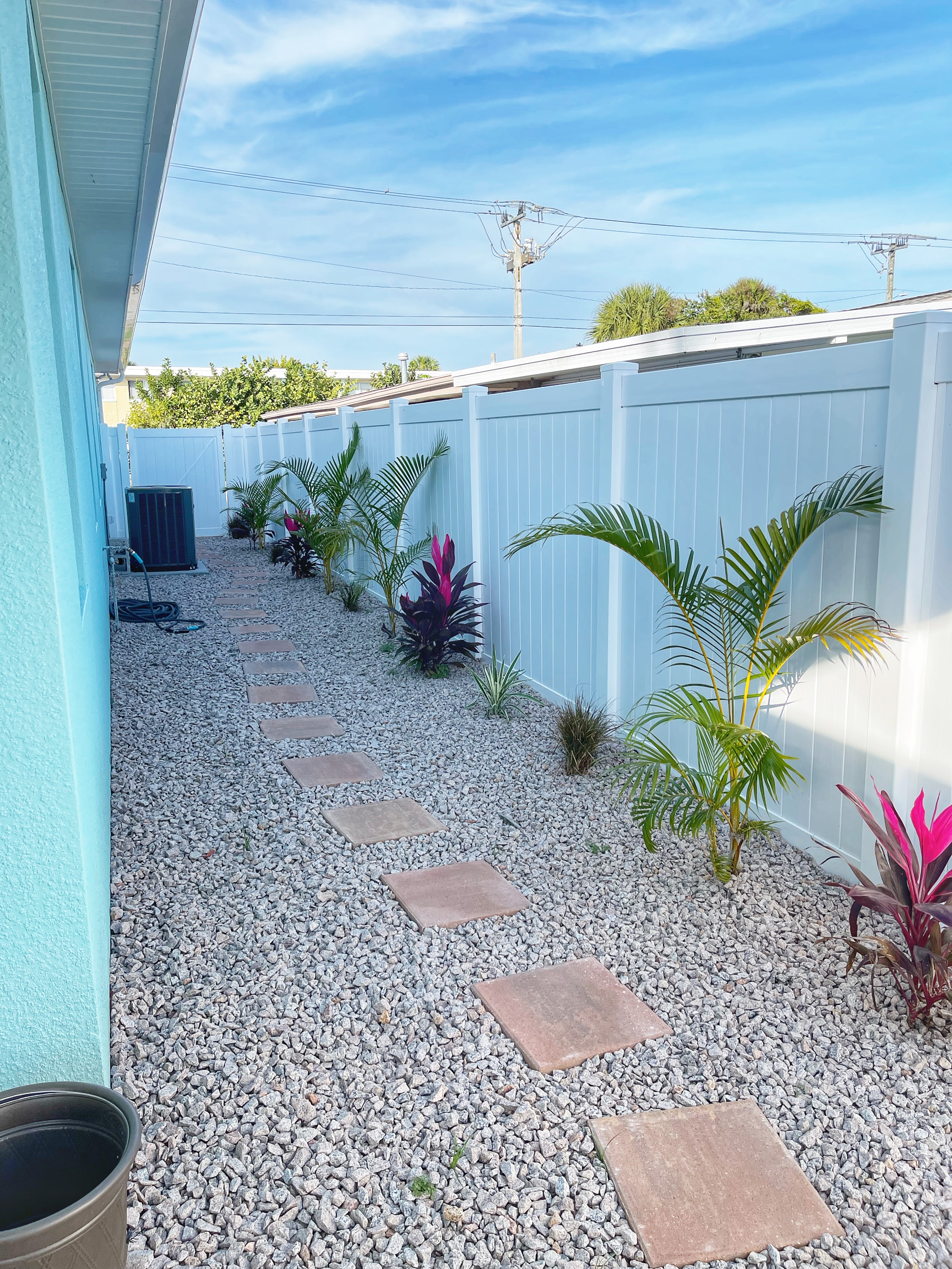 Outdoor side path and tropical landscaping
